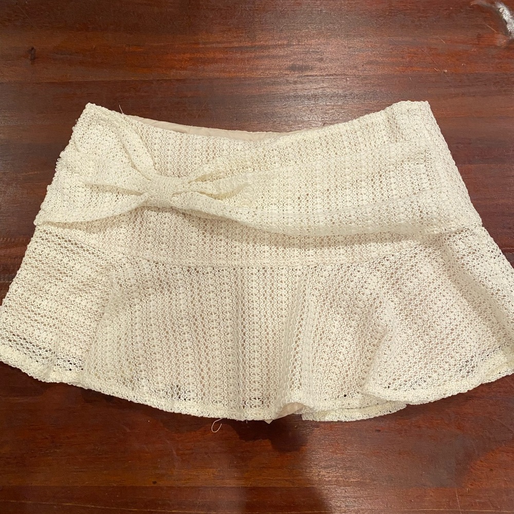 Ruffle Eyelet Bow Mini Skirt